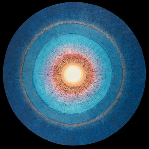 An abstract circular artwork with blue and green rings around a warm center.